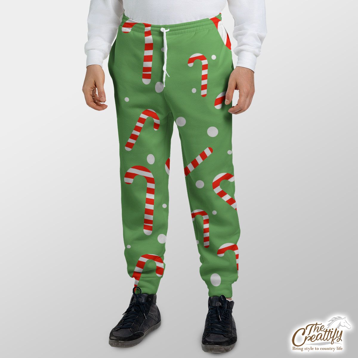 Candy Cane On Green And White Background Sweatpants