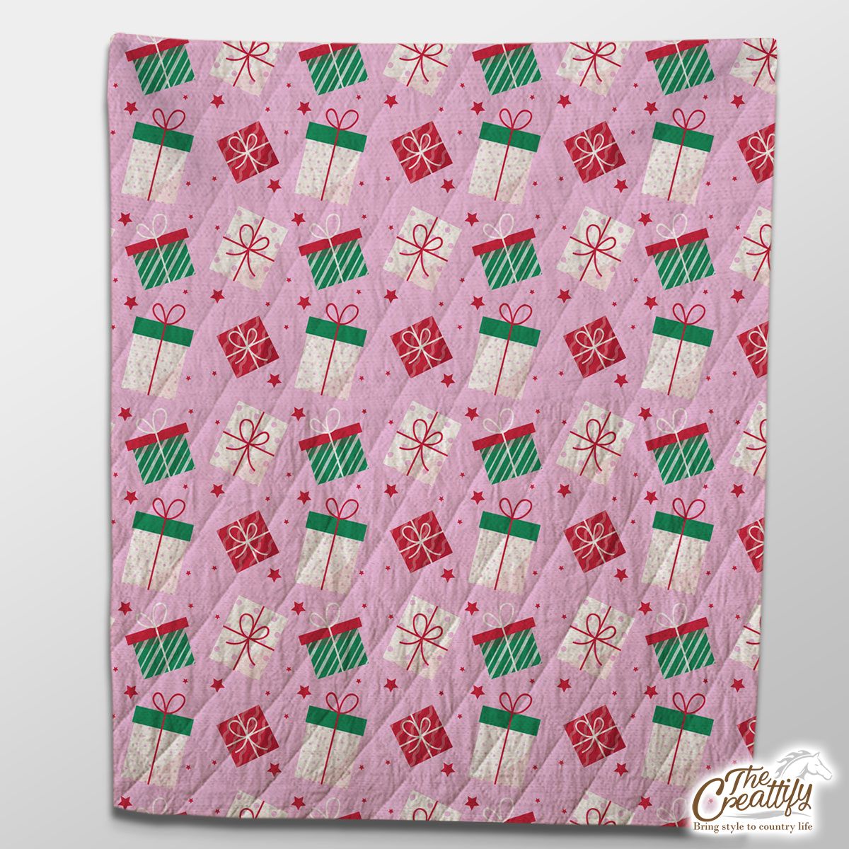 Red Green And White Christmas Gift On Pink Background Quilt