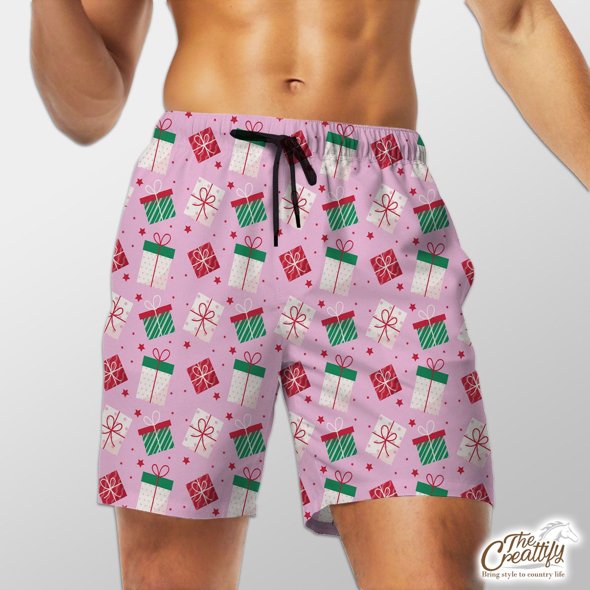 Red Green And White Christmas Gift On Pink Background Shorts