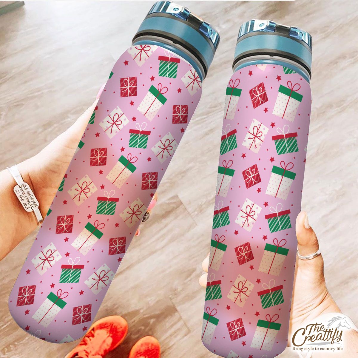 Red Green And White Christmas Gift On Pink Background Tracker Bottle