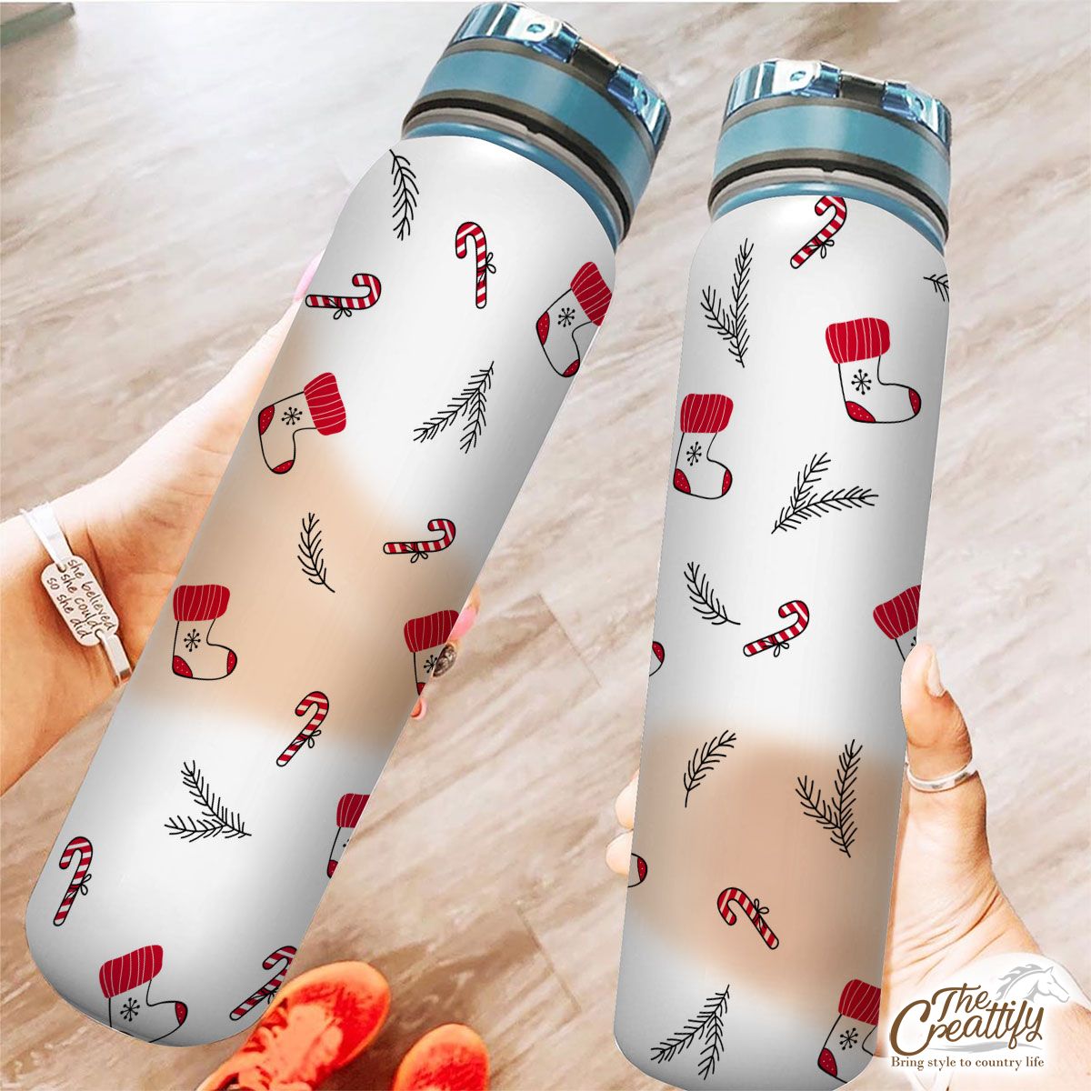 Hand Drawn Red Socks, Christmas Tree Branch And Candy Canes White Pattern Tracker Bottle