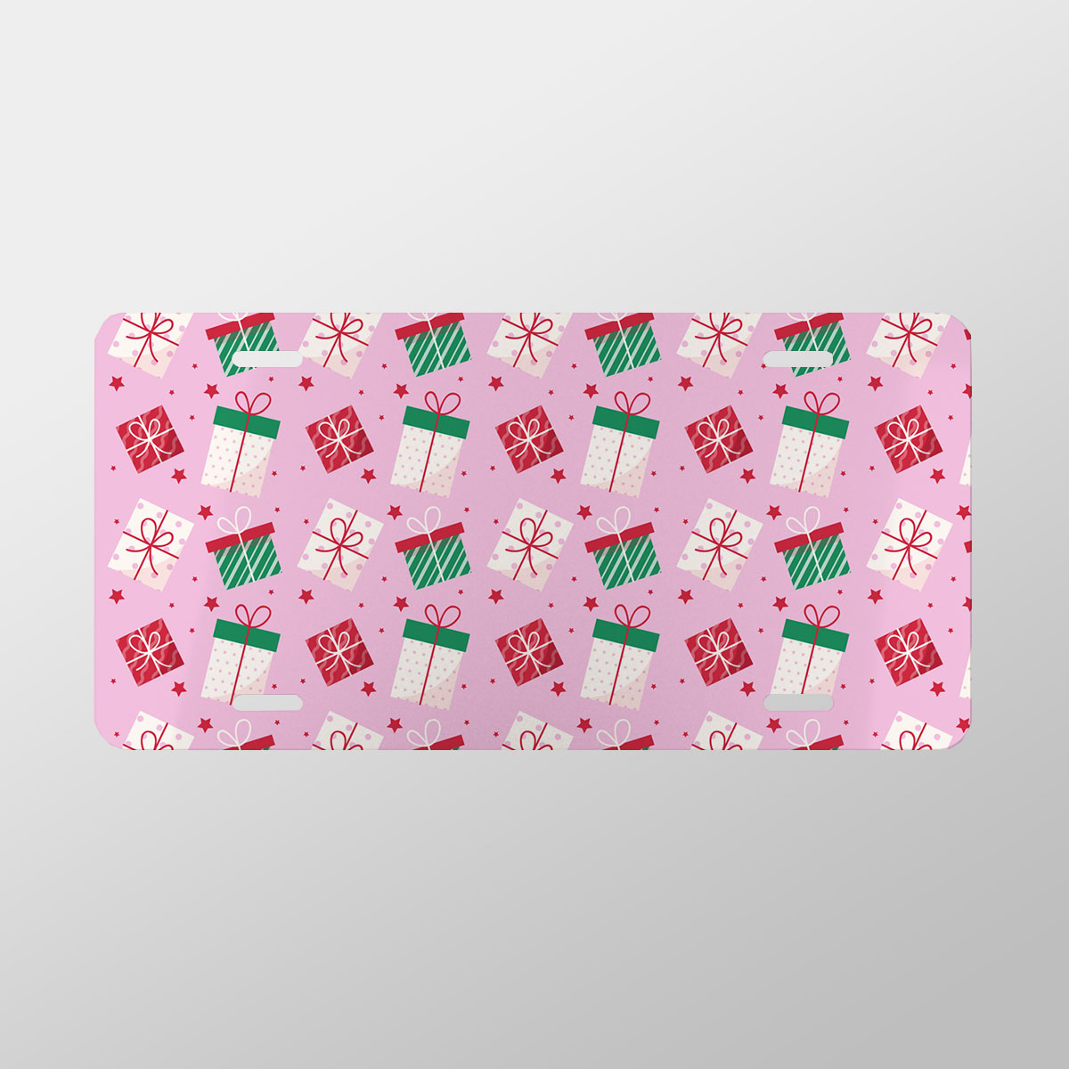 Red Green And White Christmas Gift On Pink Background Vanity Plate