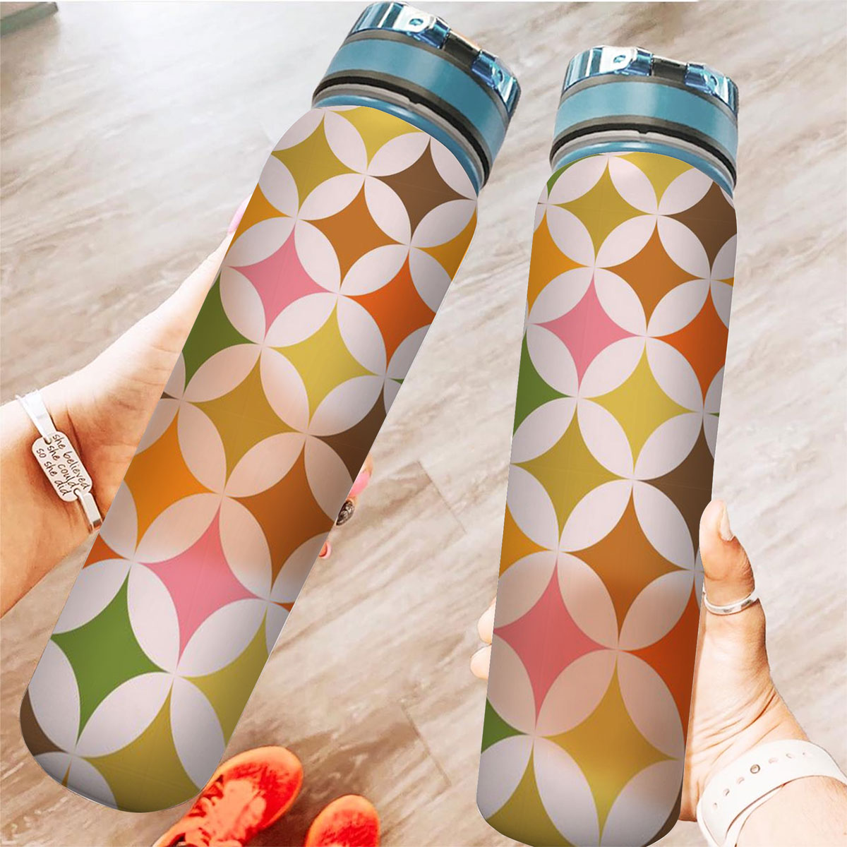 Mid Century Modern Colorful Starburst On White Circles Tracker Bottle