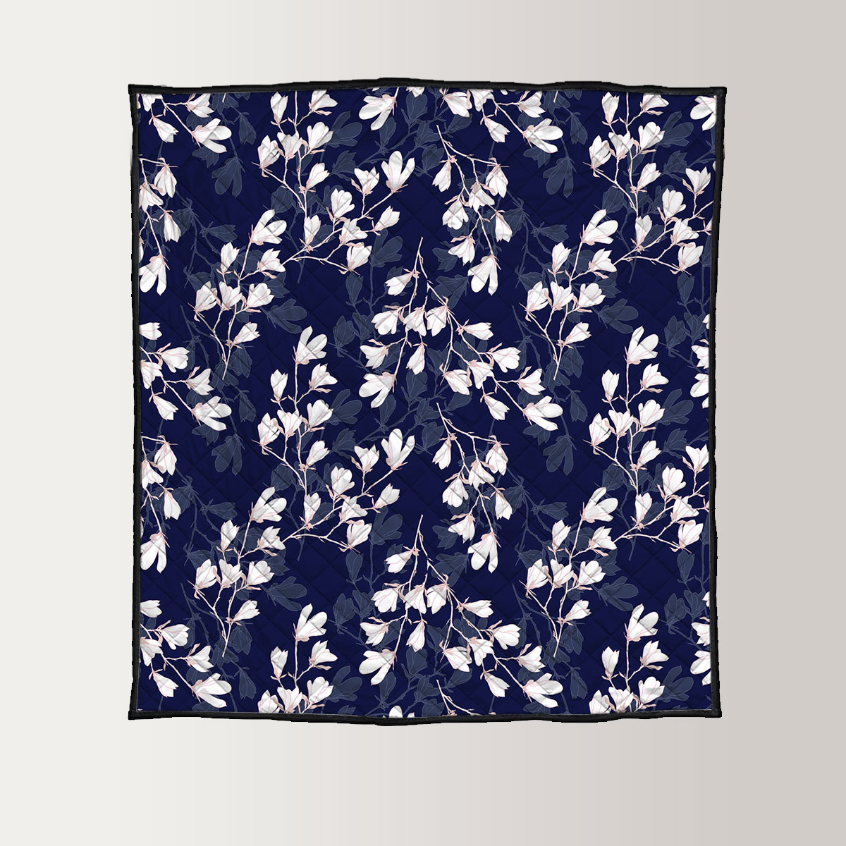 White Magnolia Flower On Dark Blue Background Quilt