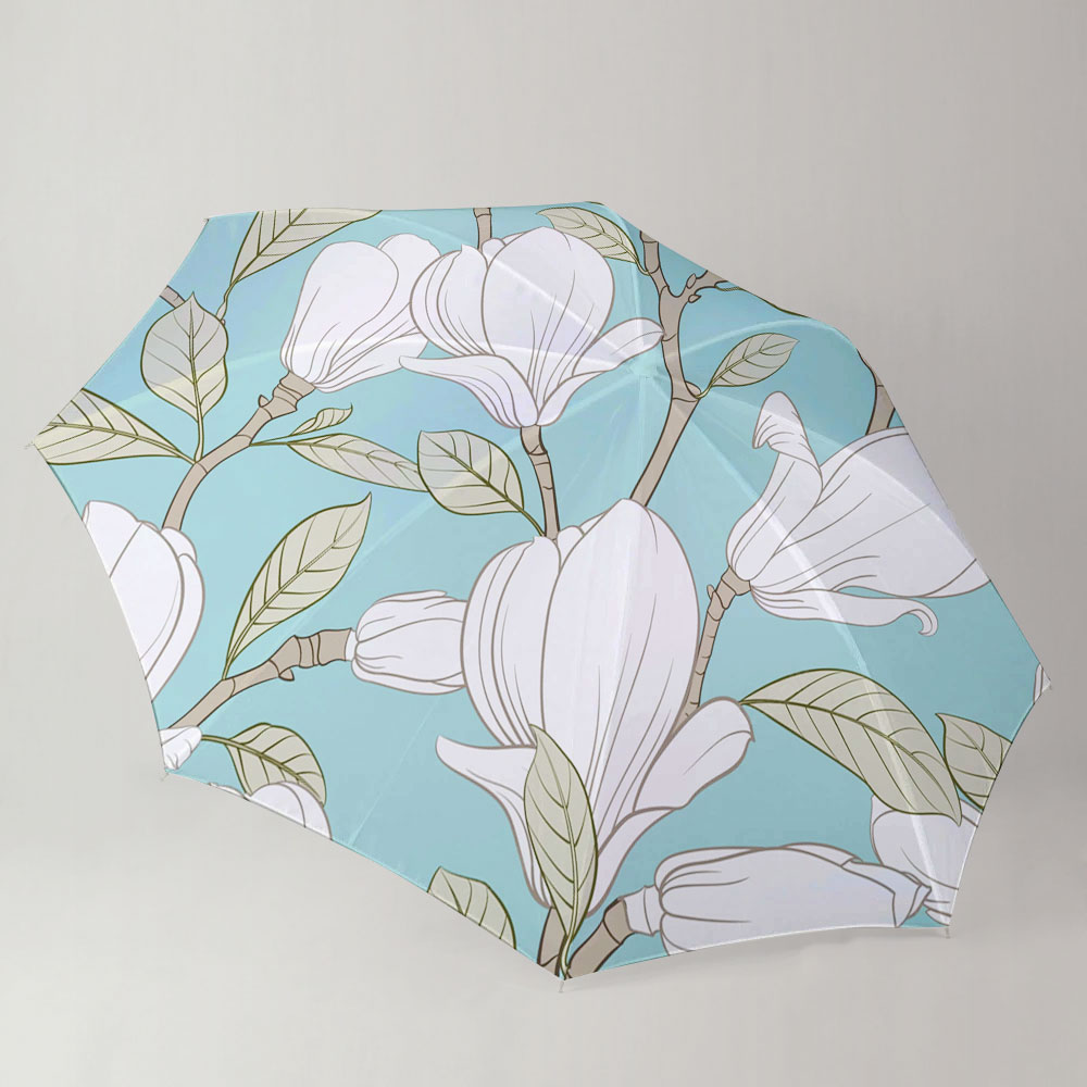 Magnolia Flower On Blue Background Umbrella