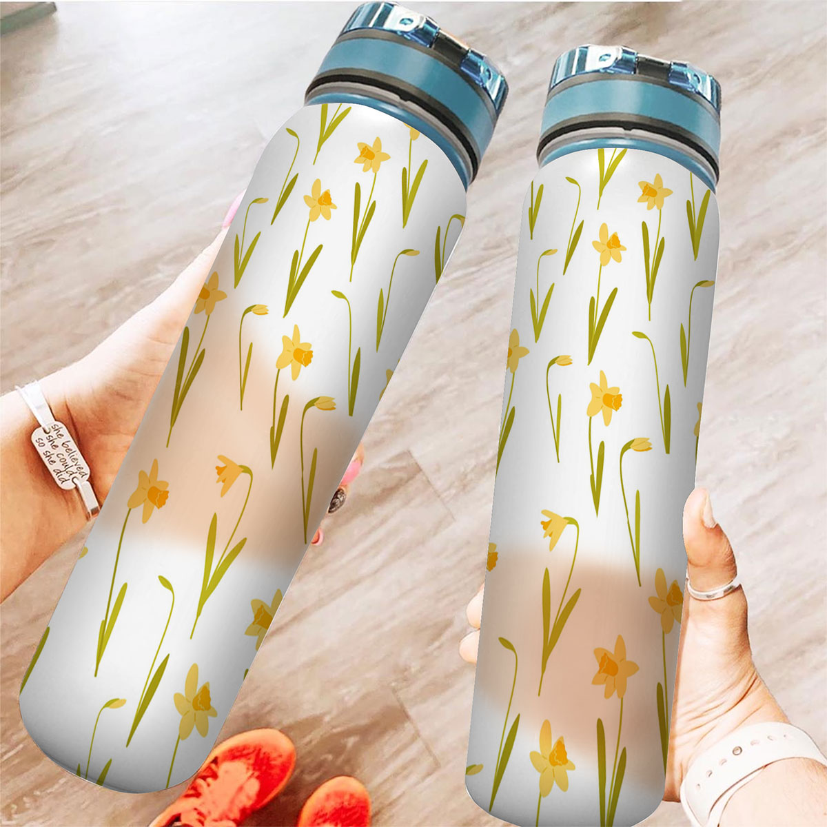Yellow Daffodils On White Background Tracker Bottle