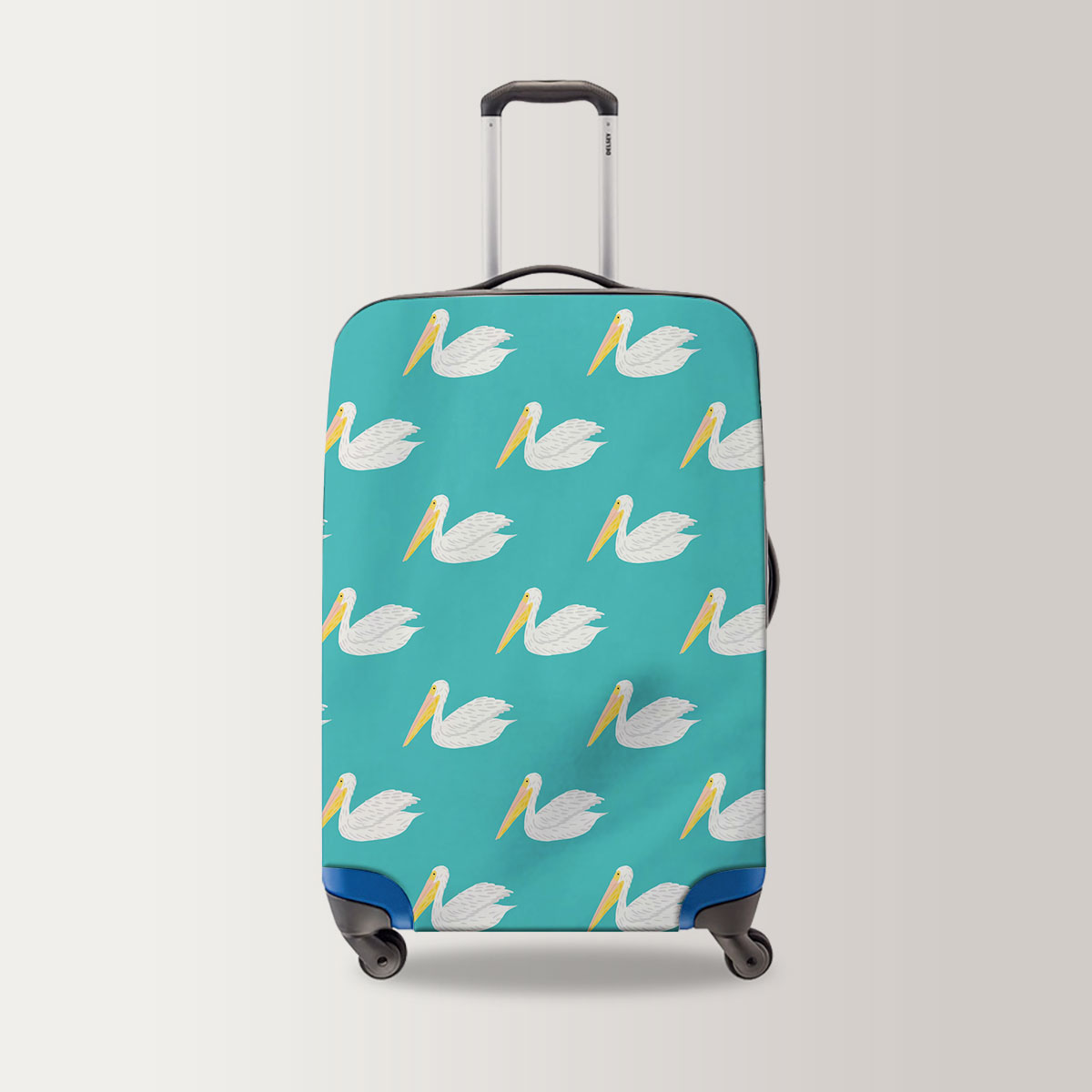 Sitting Pelican On Blue Luggage Bag