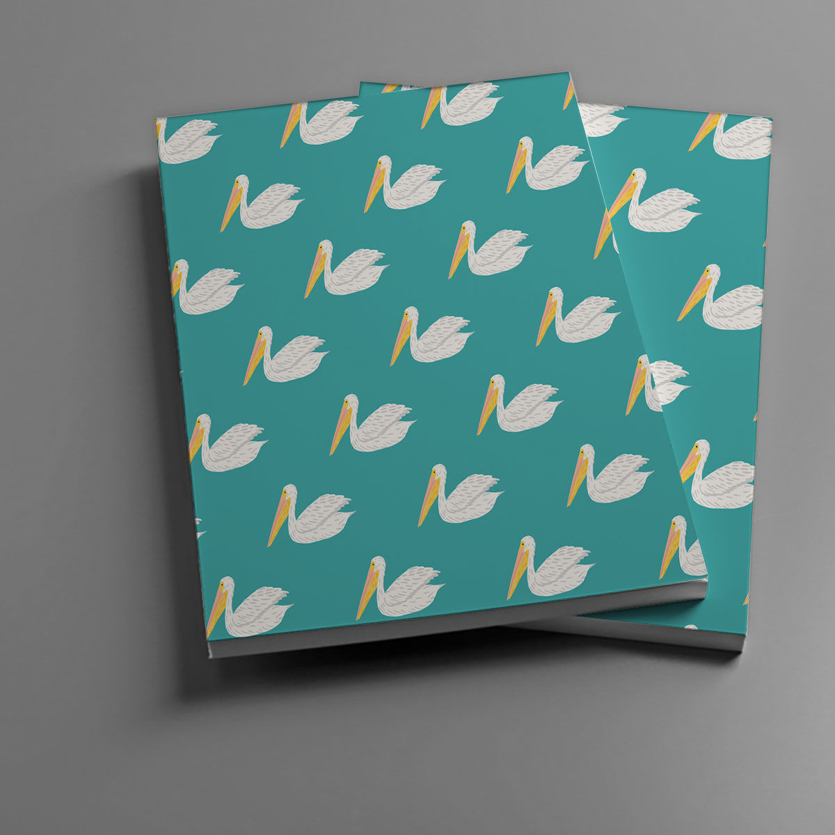 Sitting Pelican On Blue Notebook