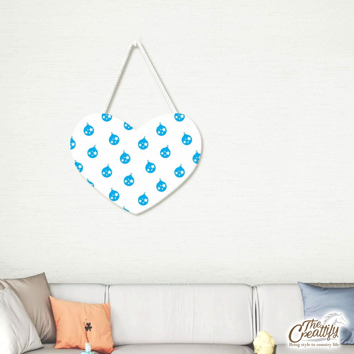 Light Blue Color Christmas Balls On The White Background Heart-Shaped Tablet