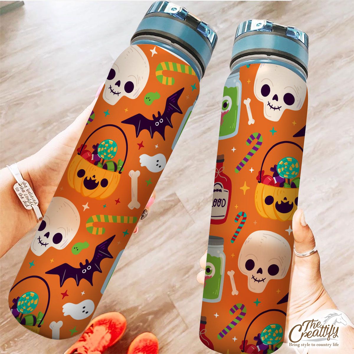 Cute Pumpkin, Jack O Lantern Full of Candy, Witch Potions and Bat Orange Halloween Tracker Bottle