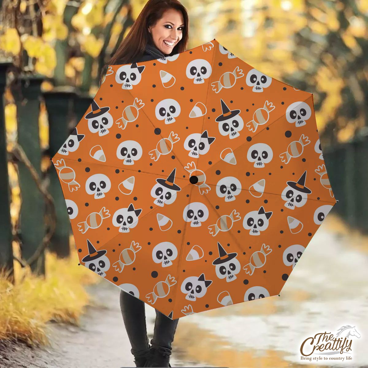 Halloween Candy Cartoon Skull With Witch Hat On Orange Color Background Umbrella