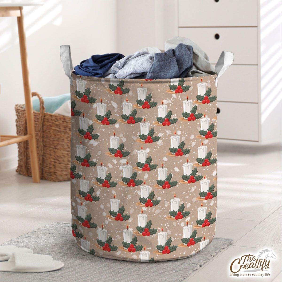 Christmas Candle With Holly Leaf On Snowflake Background Laundry Basket