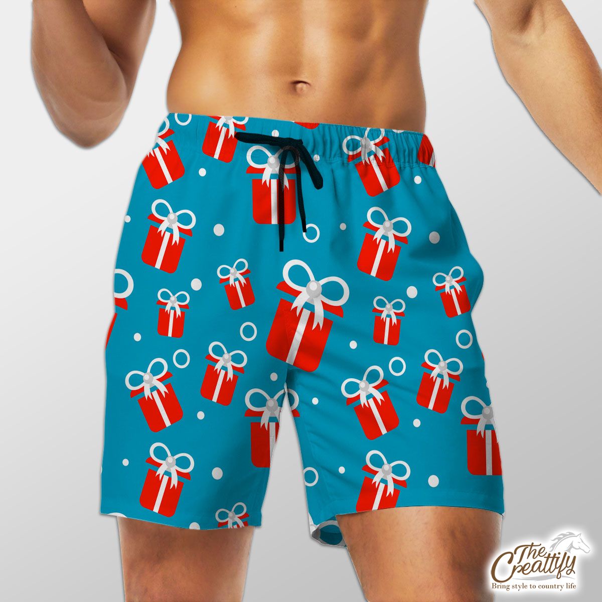 Red And White Christmas Gift On Blue Background Shorts