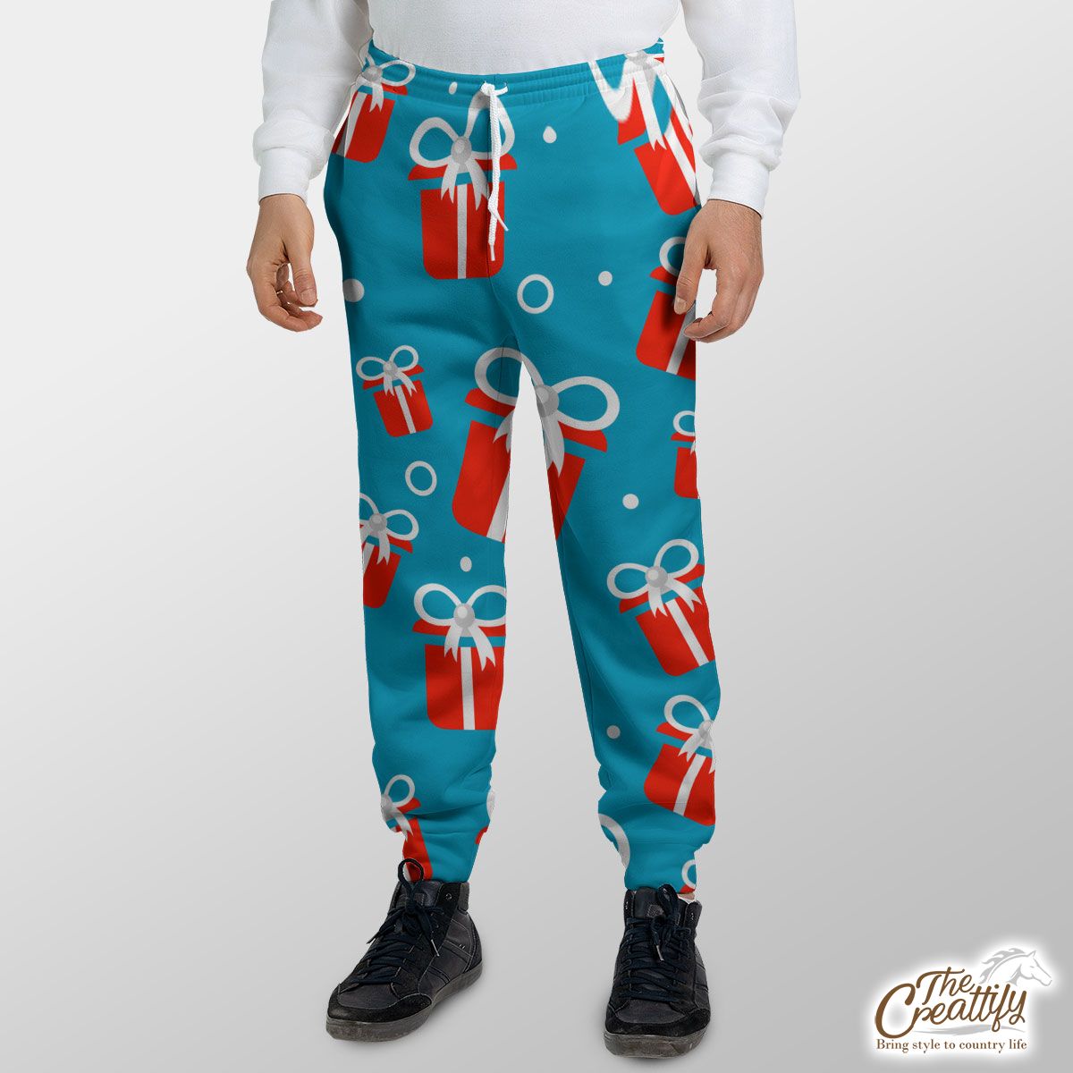 Red And White Christmas Gift On Blue Background Sweatpants