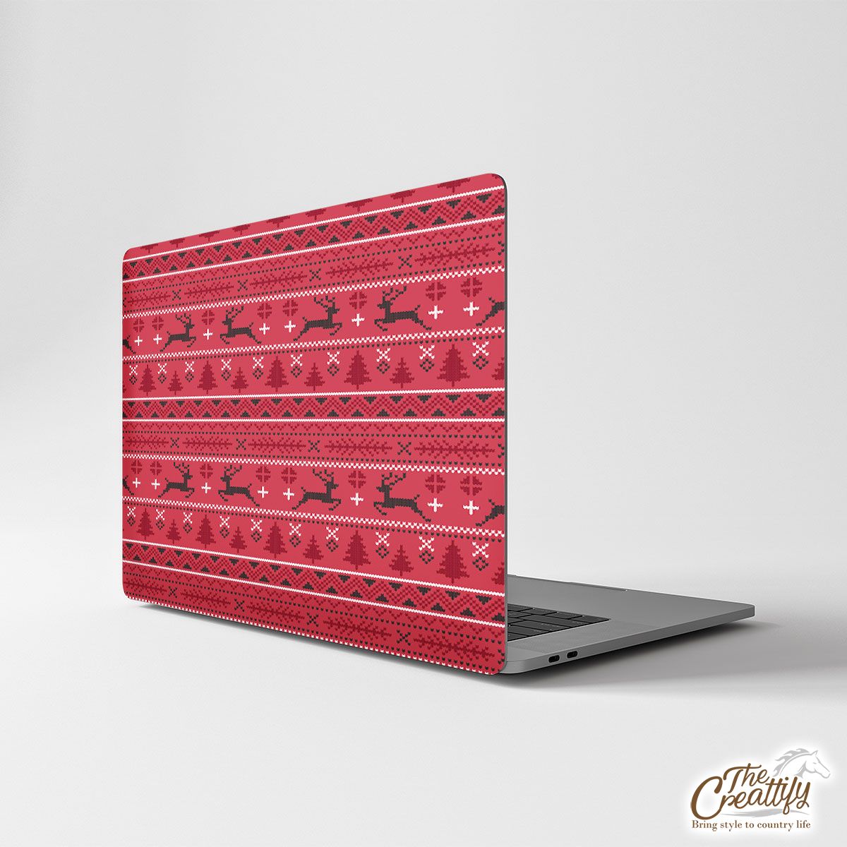 Christmas Reindeer, Pine Tree Silhouette On The Red Background Laptop Skin