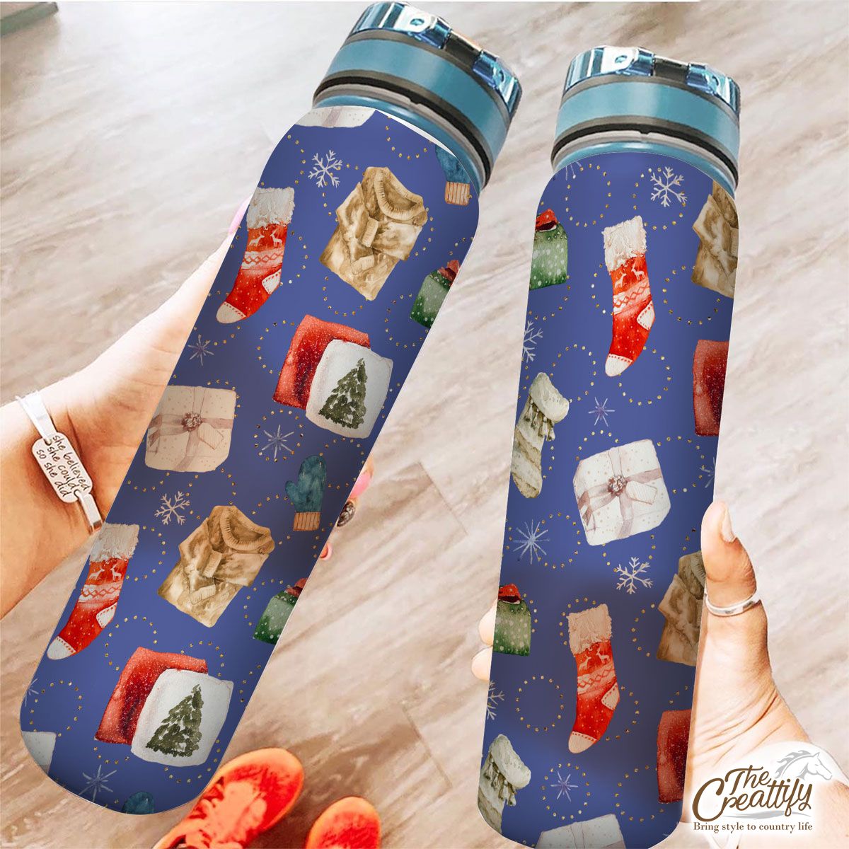 Christmas Gifts, Red Socks, Wool Gloves And Ugly Christmas Sweater Snowflake Blue Pattern Tracker Bottle