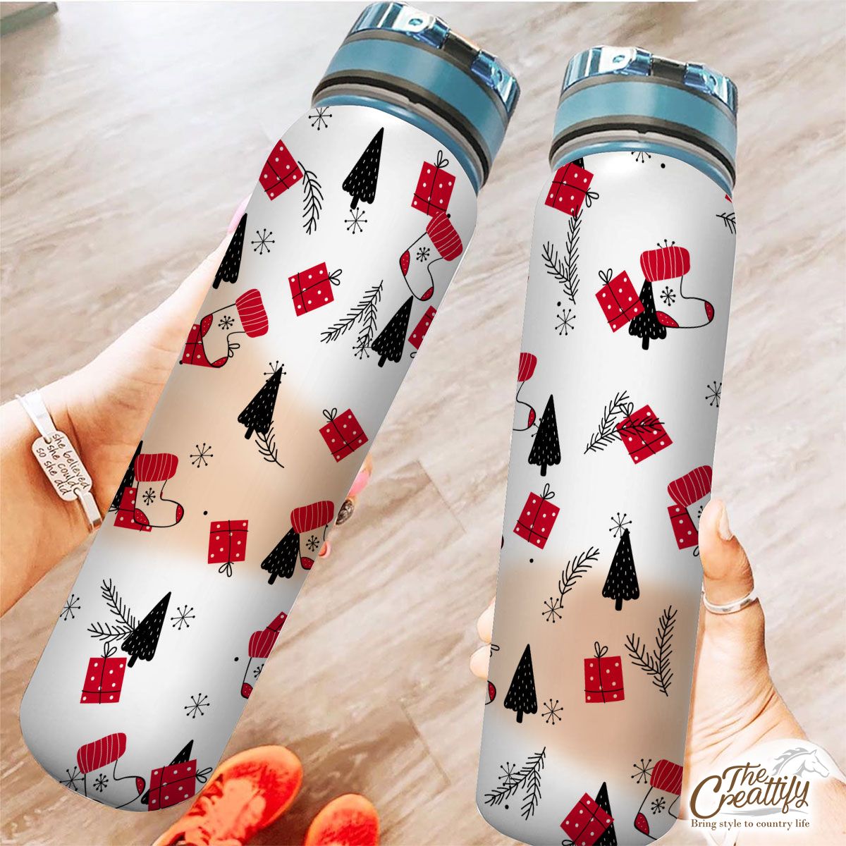 Hand Drawn Red Socks, Christmas Gifts, Pine Tree Silhouette And Snowflake Clipart Seamless White Pattern Tracker Bottle