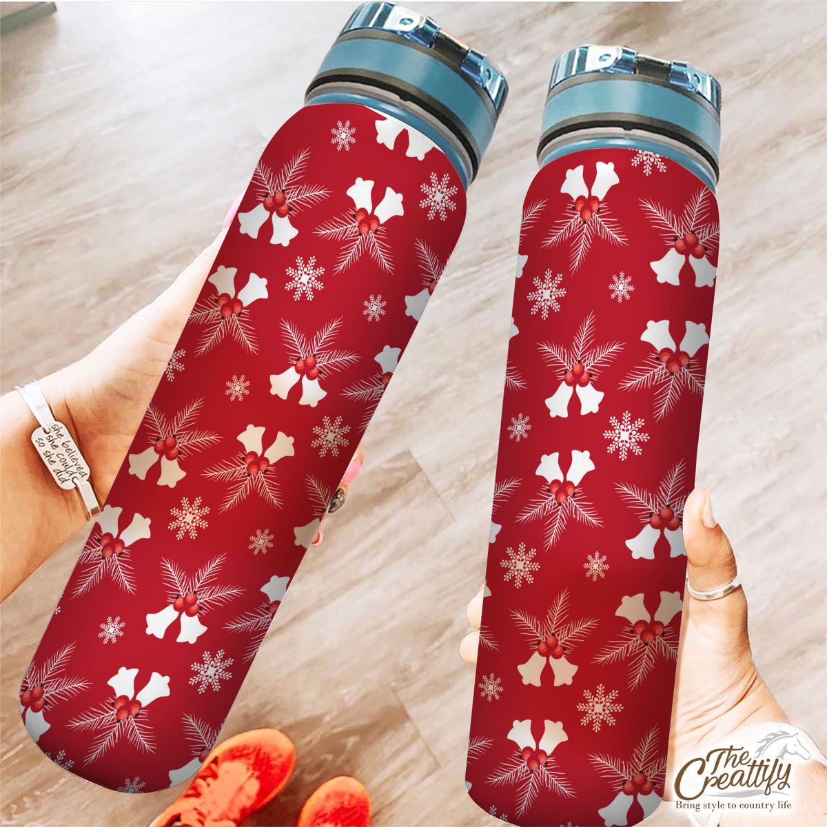 Christmas Bells With Cranberries On The Snowflake Red Background Tracker Bottle