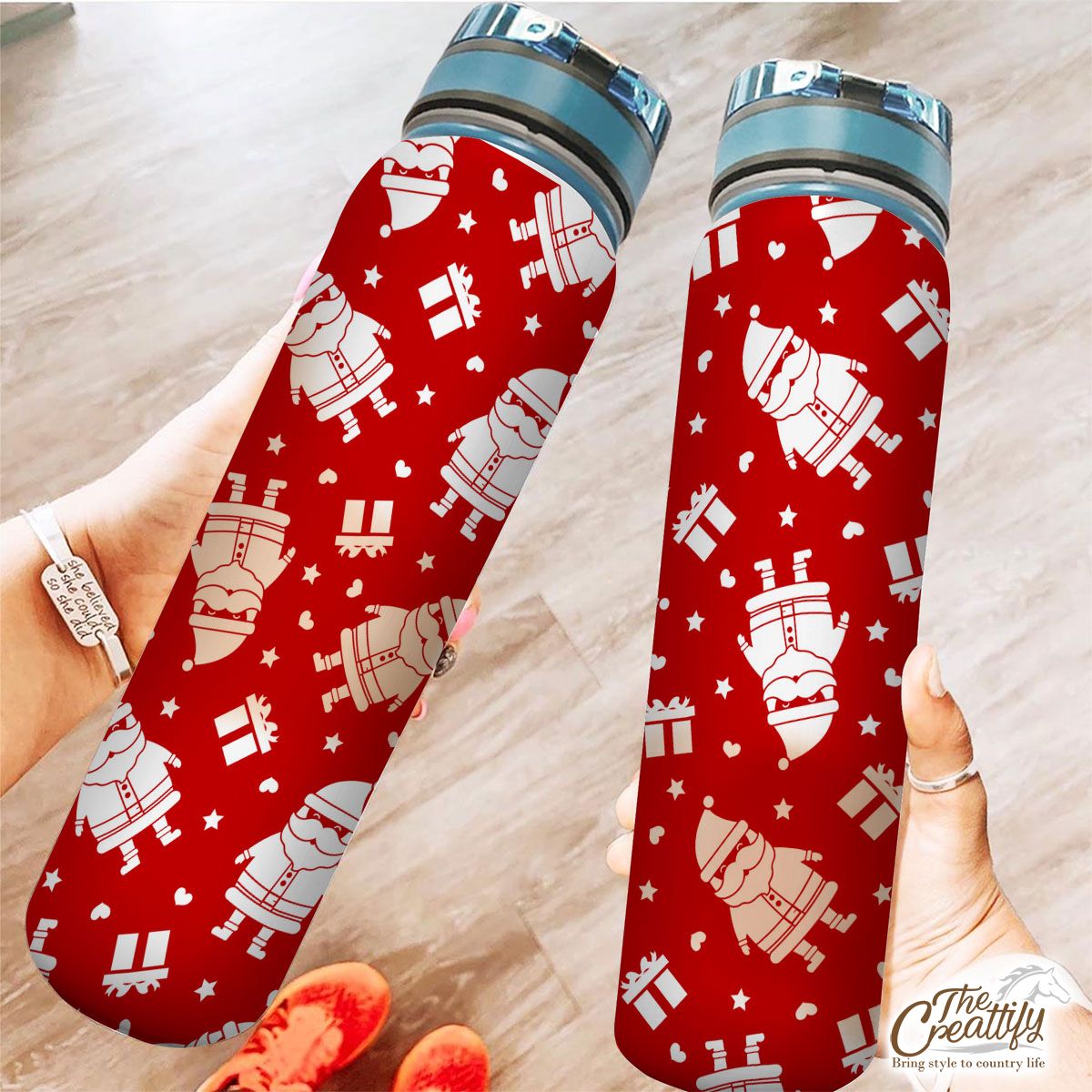 Cute Santa Claus With Christmas Gifts On The Red Background Tracker Bottle
