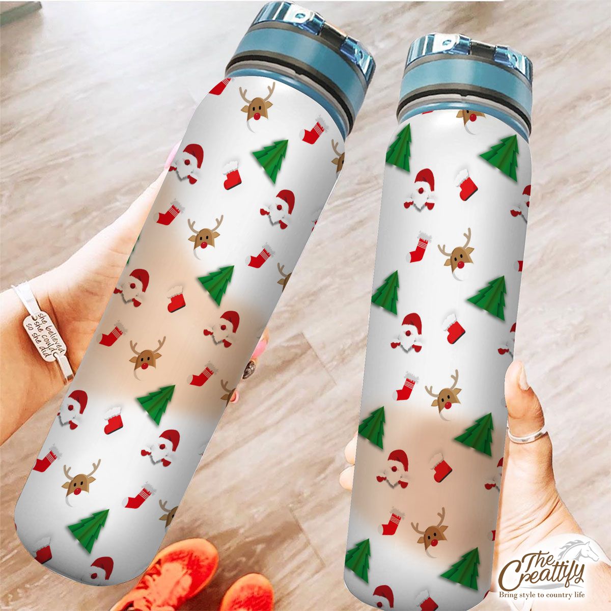 Santa Claus, Pine Tree Silhouette, Christmas Reindeer And Red Socks Seamless Pattern Tracker Bottle