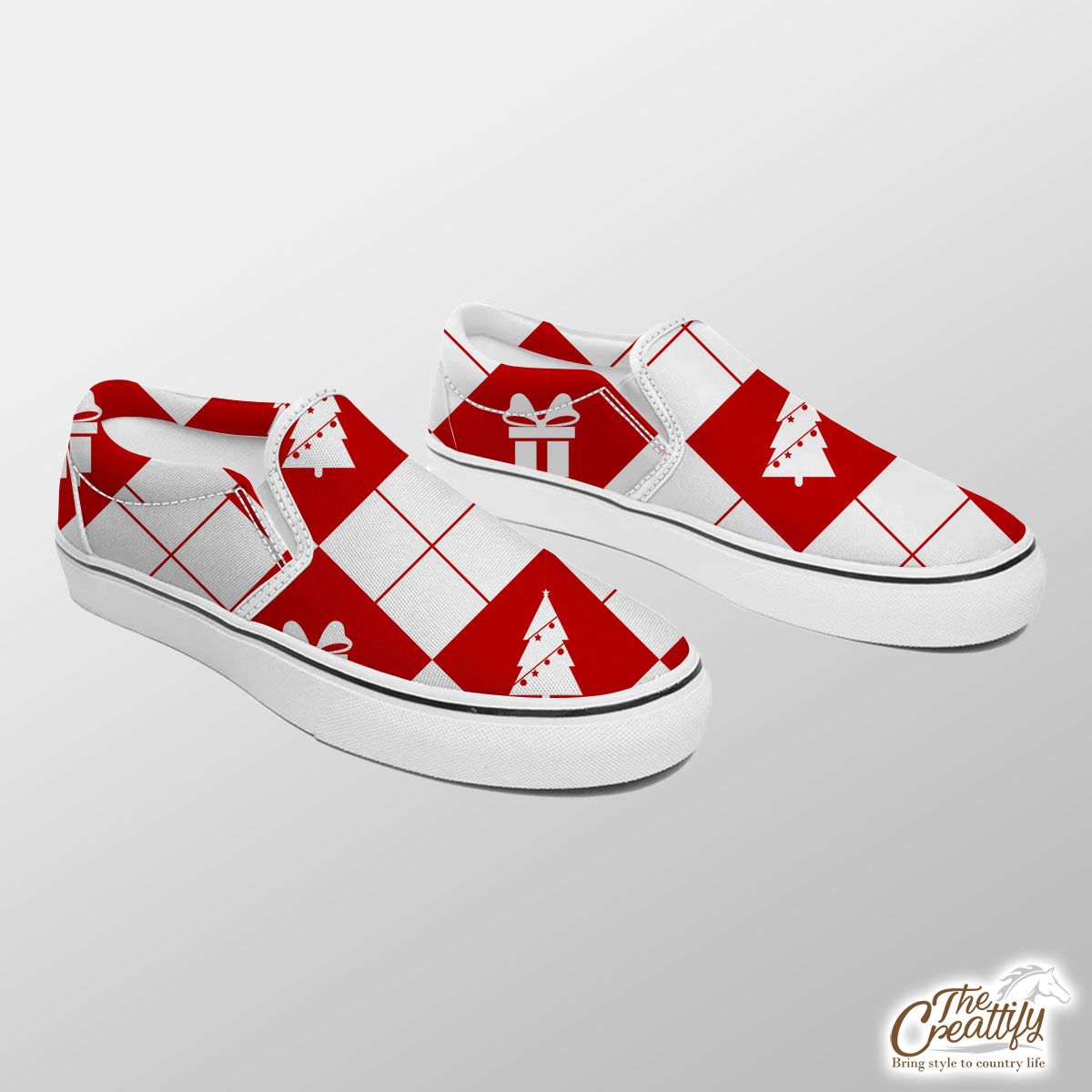 Christmas Gifts And Pine Tree Decorated With Lights On Red And White Background Slip On Sneakers