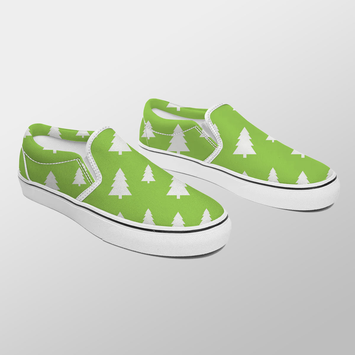Christmas Pine Tree Silhouette On The Green Background Slip On Sneakers