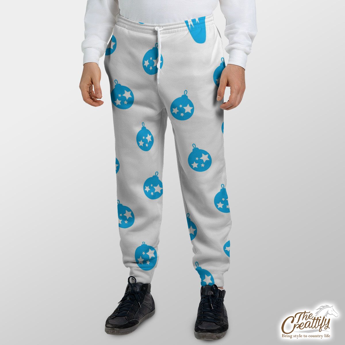 Light Blue Color Christmas Balls On The White Background Sweatpants